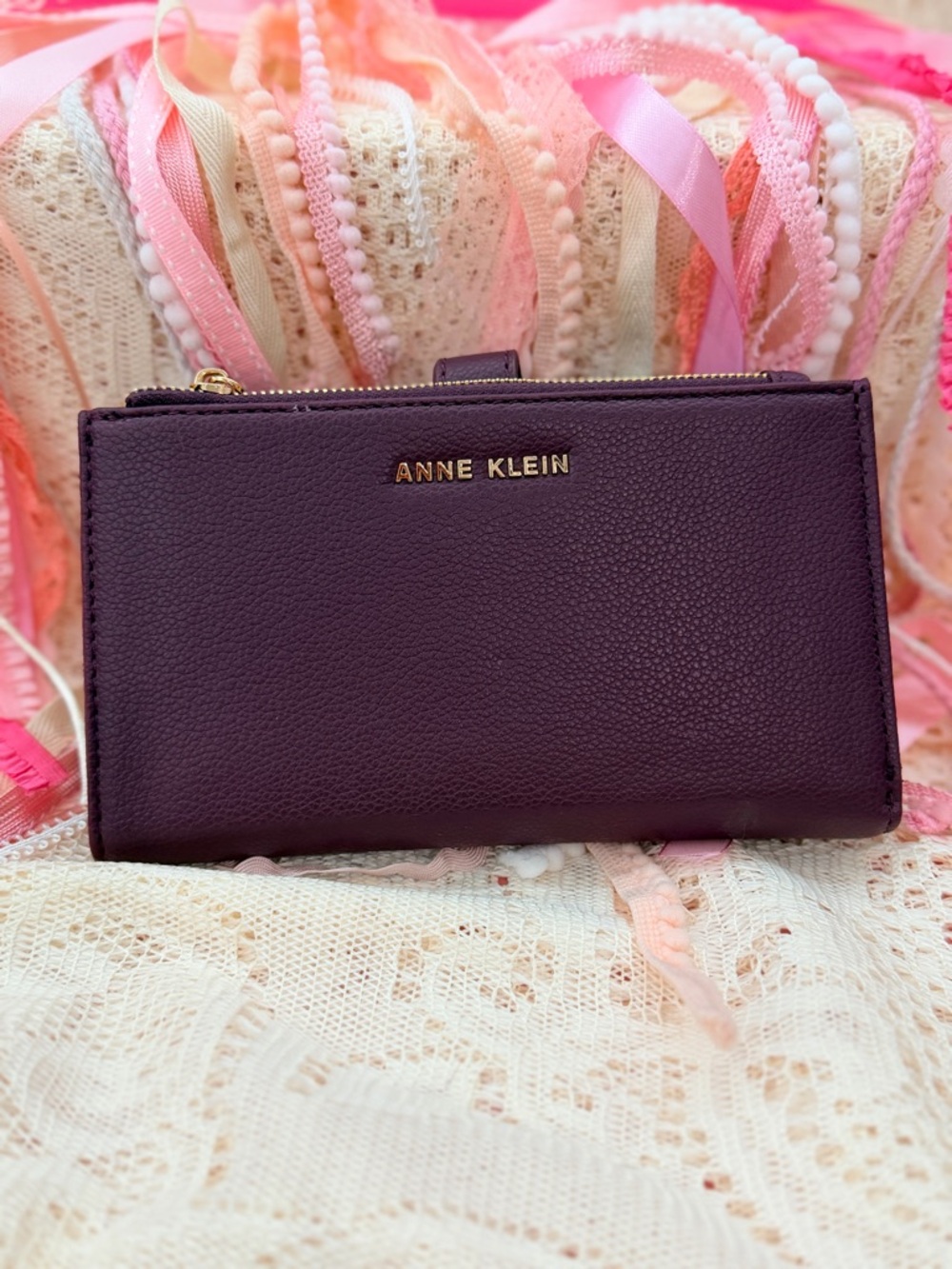 Anne Klein Deep Plum Pebble Zip Wallet with slot to hold your phone or checkbook